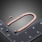 Elegáns karkötő áttetsző CZ kristályokkal, rózsaarany  bevonattal (0397.)