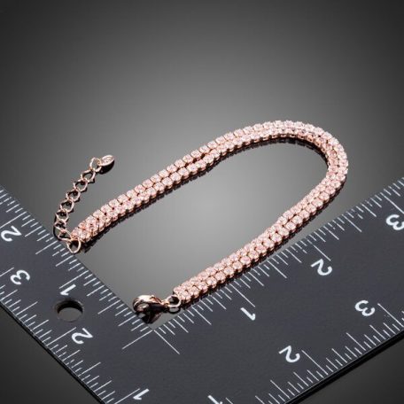 Elegáns karkötő áttetsző CZ kristályokkal, rózsaarany  bevonattal (0397.)