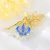 Arannyal bevont exkluzív tündér bross kék és színjátszó Swarovski kristályokkal (0601.)