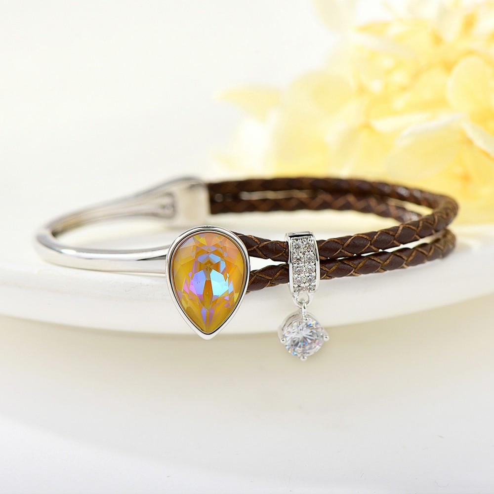 Image of Platinával bevont karkötő színjátszó pezsgőszínű csepp alakú Swarovski kristállyal, barna bőrszíjjal (0402.)