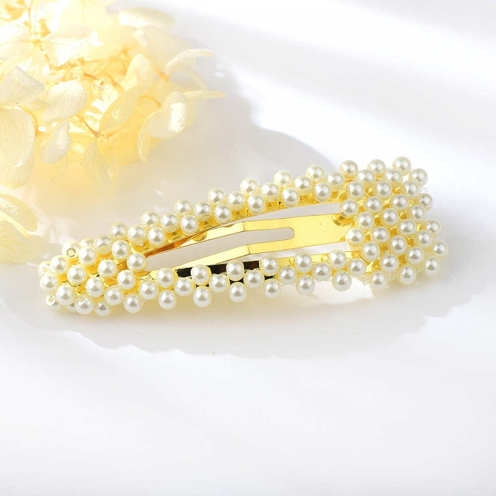 Image of Arannyal bevont hajcsat krémszínű kagylóhéj gyöngyökkel (0584.)