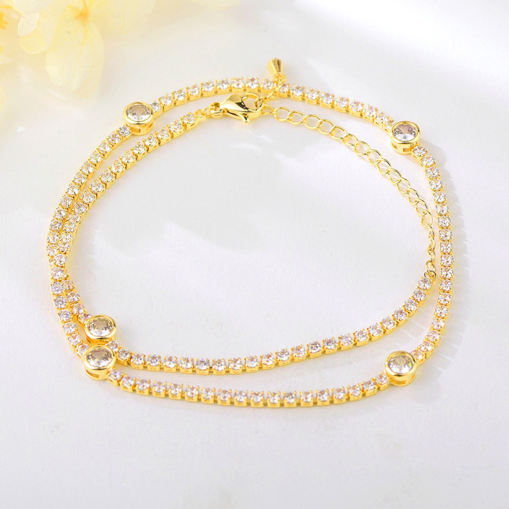 Image of Arannyal bevont elegáns kétsoros karkötő áttetsző cirkónia kristályokkal (0290.)