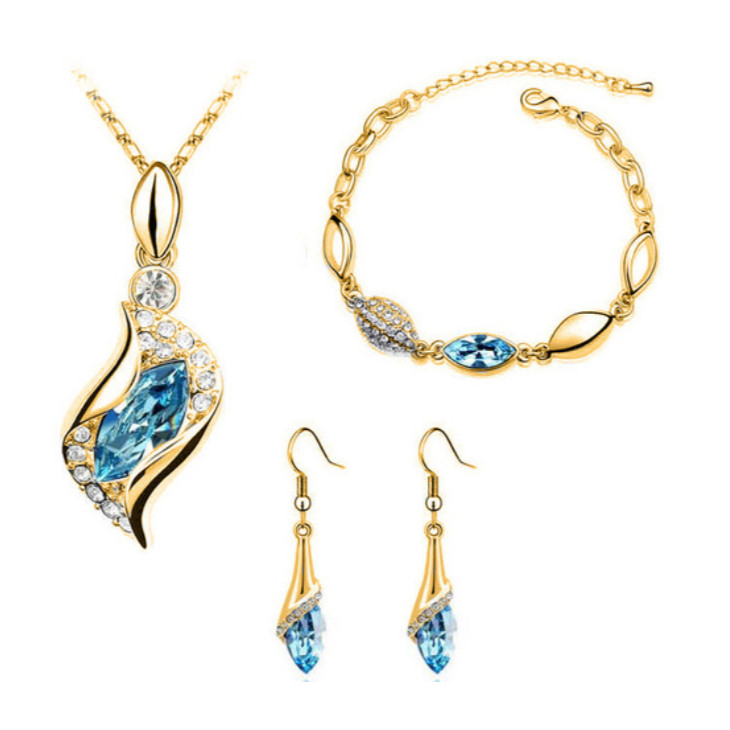 Image of Arannyal bevont 3 részes ékszerszett türkiz és áttetsző kristályokkal (0105.)