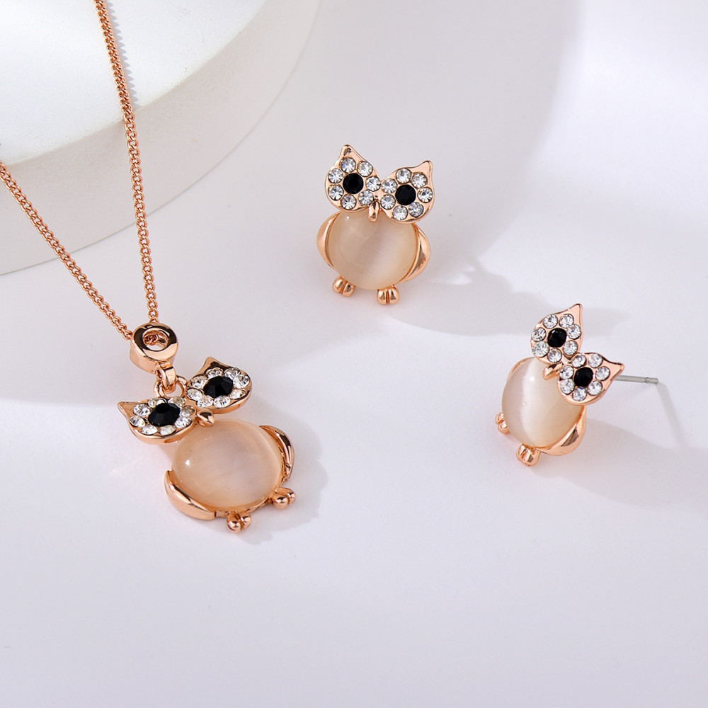 Image of Rózsaarannyal bevont bagoly ékszerszett opál díszítéssel (0001.)